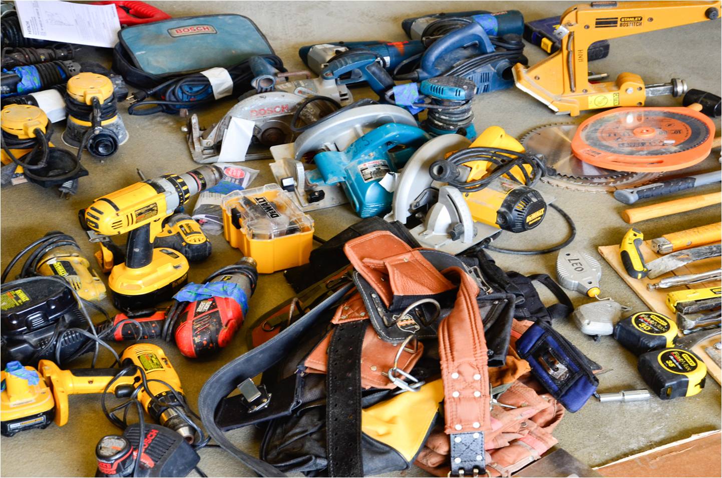 Group of powertools and builders hand tools