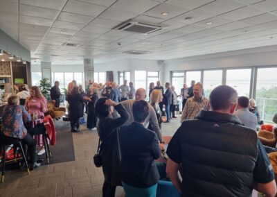 Attendees at meeting mix and mingle