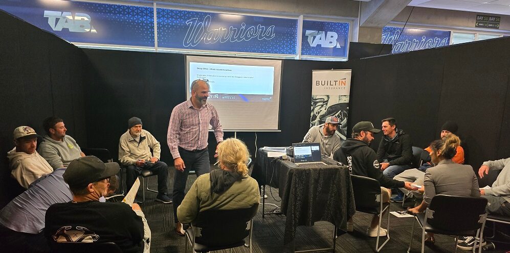 Tradespeople gathering at a seminar